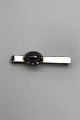Georg Jensen 
Sterling Sølv 
Slipsenål No. 
17 (Hæmatit) 
Måler 5.7 cm 
(2.24 inch) 
Vægt 13.76 gr 
...