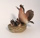 Dahl Jensen. Porzellanfigur. Vogel im Nest. Modell Nr. 1349. Höhe 12,5 cm. (1 
quality)