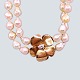 Charlotte 
Lynggard for 
Ole Lynggaard; 
A flower clasp, 
made of 14k 
gold with two 
brillant-cut 
...