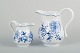 Meissen blue onionTwo creamers, early 20th century.