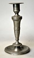 Pewter 
candlestick, 
1857. Denmark. 
With engraving 
on base: FG 
1854. H: 17 cm. 
Dia: 9 cm.
