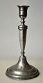 Danish empire 
pewter 
candlestick, 
19th century. 
Foot with pearl 
rod. 6-sided 
stem. 
Unstamped. ...