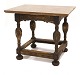 Schwarz 
dekorierter 
Barocktisch mit 
grauer 
Steinplatte. 
...