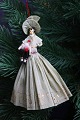 Old Christmas tree ornament, nice lady holding a small Santa Claus doll, made of colored crepe ...