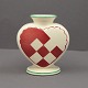 Aluminia red 
christmas heart 
in faience. 
With space for 
a candle and 
two branches. 
H. 7.5 cm. W. 
...