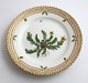 Royal Copenhagen, Flora Danica. Cake plate. Design # 3552. Diameter 14,5 cm. (1 
quality). Hypericum humifusum L