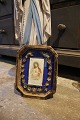 Decorative, old religious picture (with glass) with Jesus picture and fine flower wreath in ...