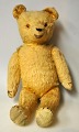 Alter Teddybär, 20. Jahrhundert. Gelber Plüsch mit Wildleder. Höhe: 42 cm.