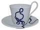 Royal Copenhagen Musica, high handle cup with matching saucer. Decoration B.Designed by ...