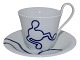 Royal Copenhagen Musica, high handle cup with matching saucer. Decoration F.Designed by ...