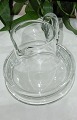 Holmegaarg 
Glasherstellern, 
Wasserkrug, 
Höhe am Griff 
16 cm. Breite 
18 cm. 1 Liter. 
Tadelloser ...