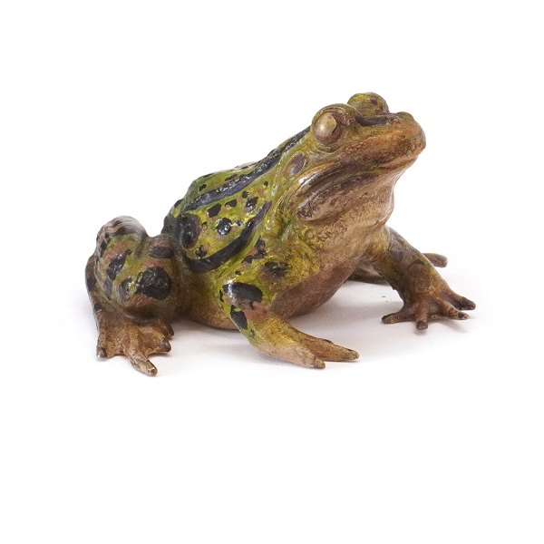 Polychrom dekorierte Wienerbronze. H: 4cm. L: 6cm