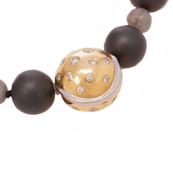 Lynggaard Copenhagen Kugelschliesse aus 14kt Gold mit 34 Diamanten. D: 14mm